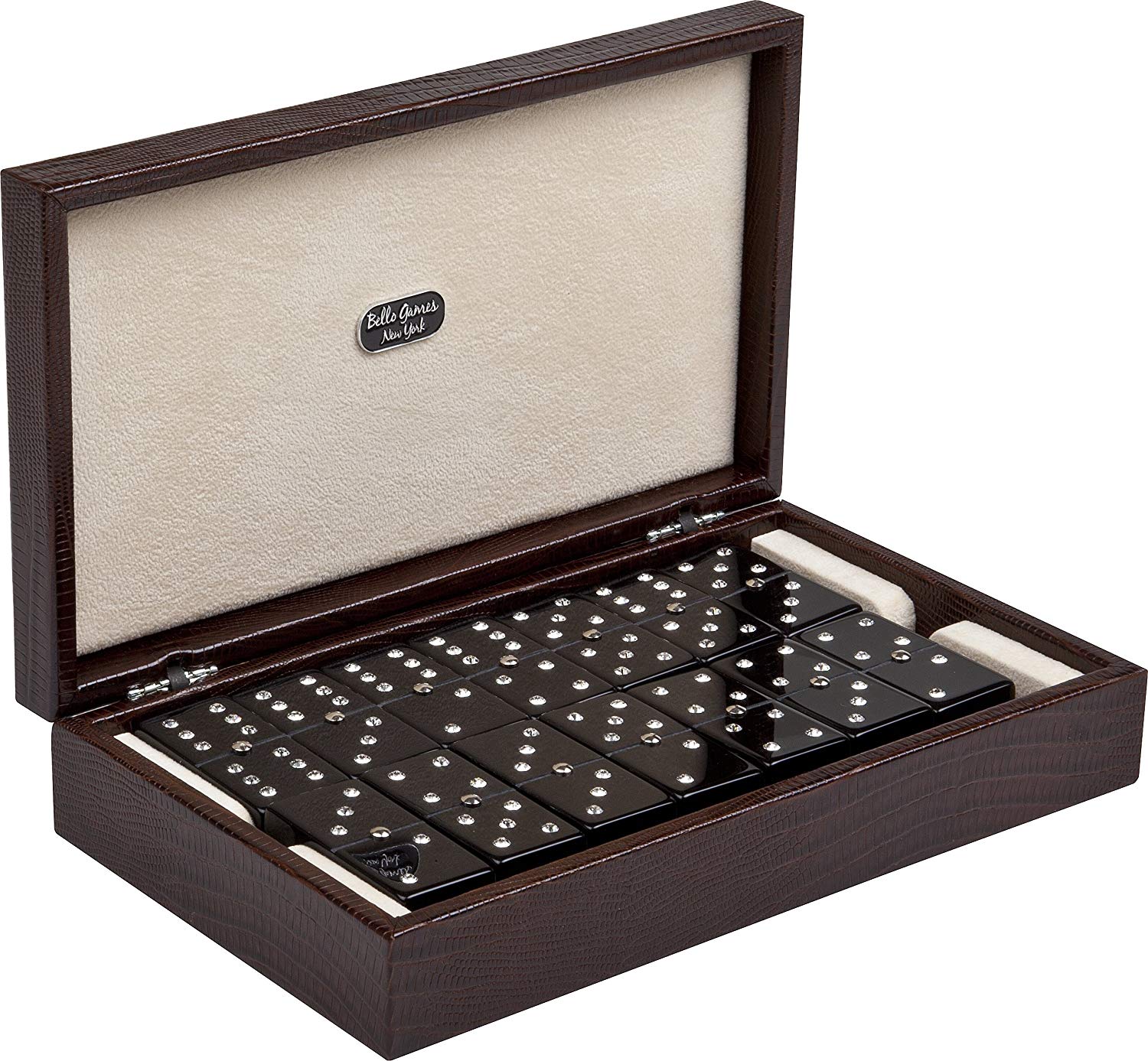 Open wooden case containing domino tiles arranged in rows