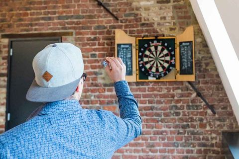 guy playing darts