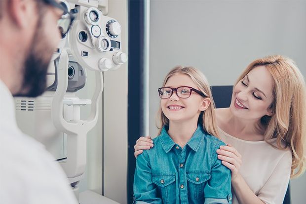 Small Cute Blond Girl is Trying on Glasses — Angleton, TX — Brent Mixon, OD Small Cute Blond Girl is Trying on Glasses — Angleton, TX — Brent Mixon, OD