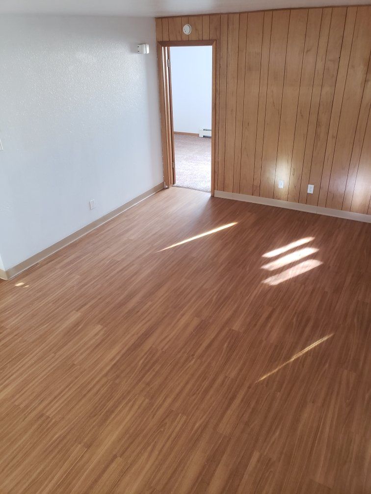 Alternate interior of bedroom with window and light fixture
