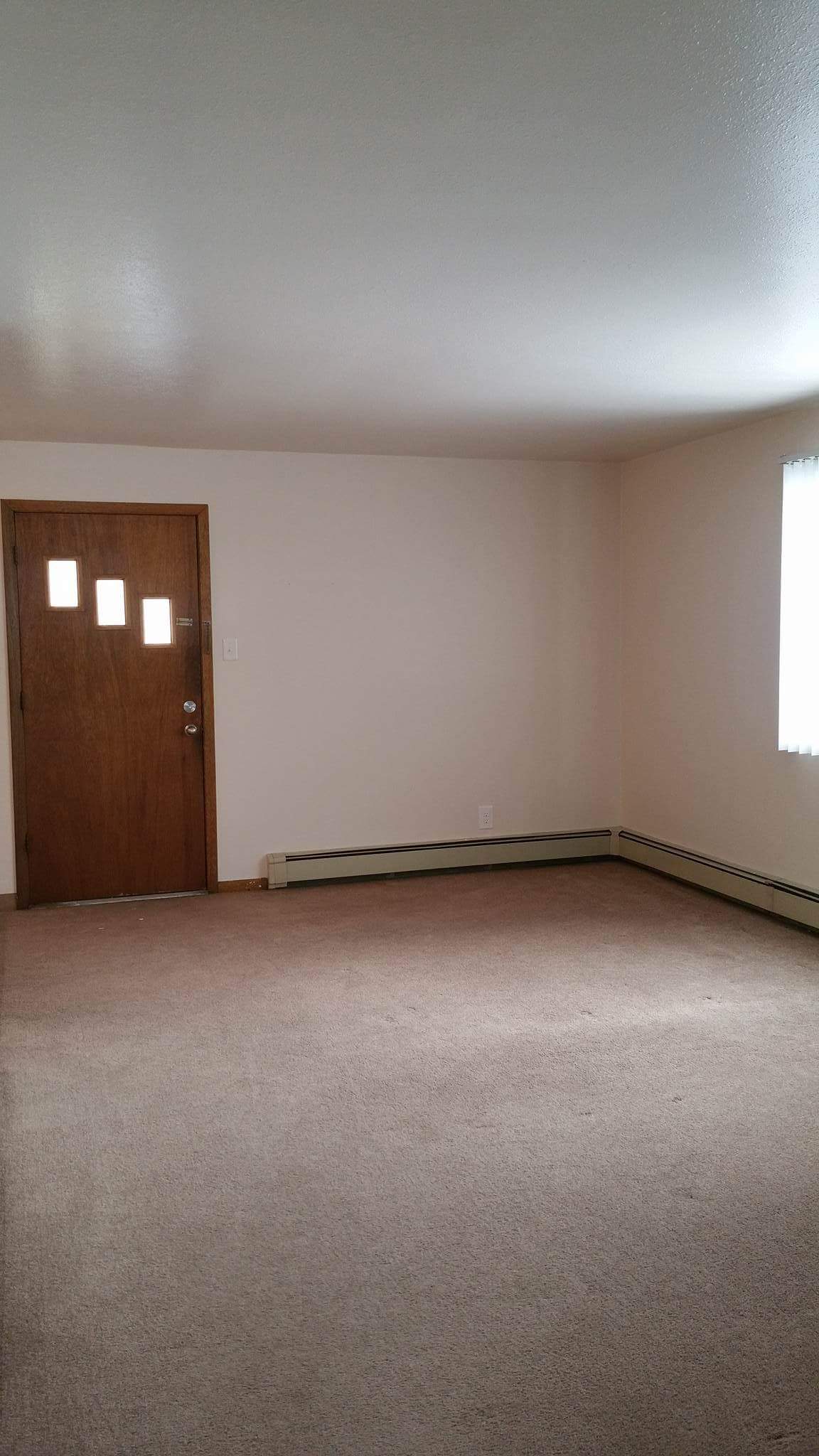 Interior of Gooder Apartments front door and entryway