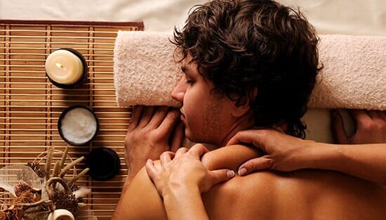 Man getting a Shoulder Massage — Family Massage in Bloomington, IL
