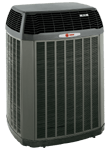 Gray Trane air conditioning unit outdoors.