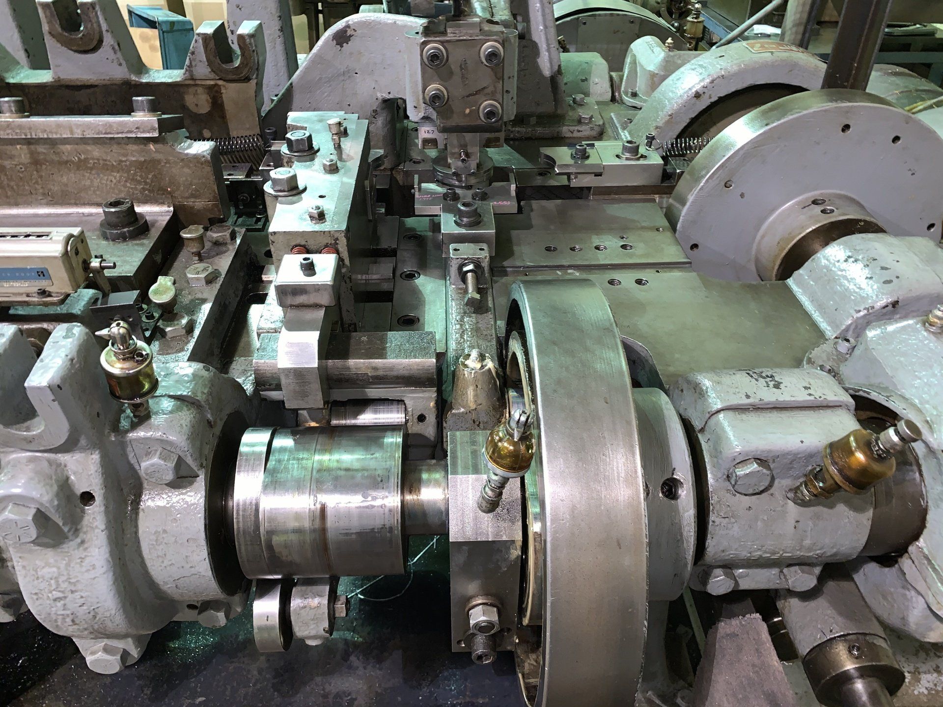 A machine is sitting on a table in a factory.
