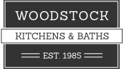 Woodstock Kitchens & Baths logo with “EST. 1985” in white on dark gray