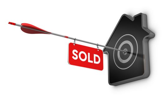 Home with Sold Sign