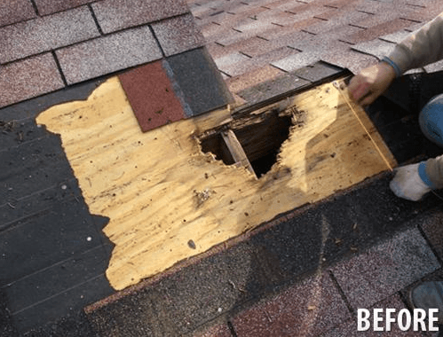 A person is working on a roof with a hole in it.