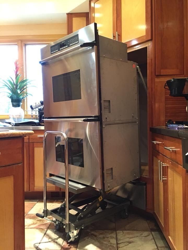 At Kitchen With Modern Stainless Oven — De Soto, MO — Midwest Appliance Repair Heating & Cooling