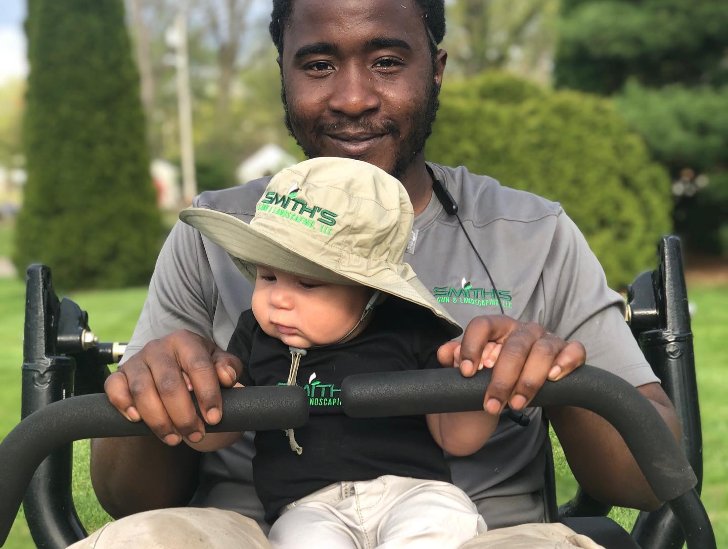 Man And Baby — Fairborn, Ohio — Smith’s Lawn & Landscaping