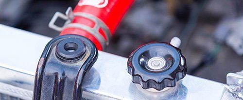 Radiator cap for engine cooling in racing car