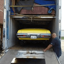 Auto Storage - Moving Company in Orland Park, IL Moving company transporting a vehicle in Frankfort, IL