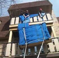 Movers Arranging a Bed - Moving Company in Orland Park, IL Movers Arranging a Bed - Moving Company in Orland Park, IL