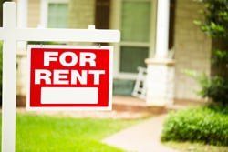 For Rent Sign in Front of a Home