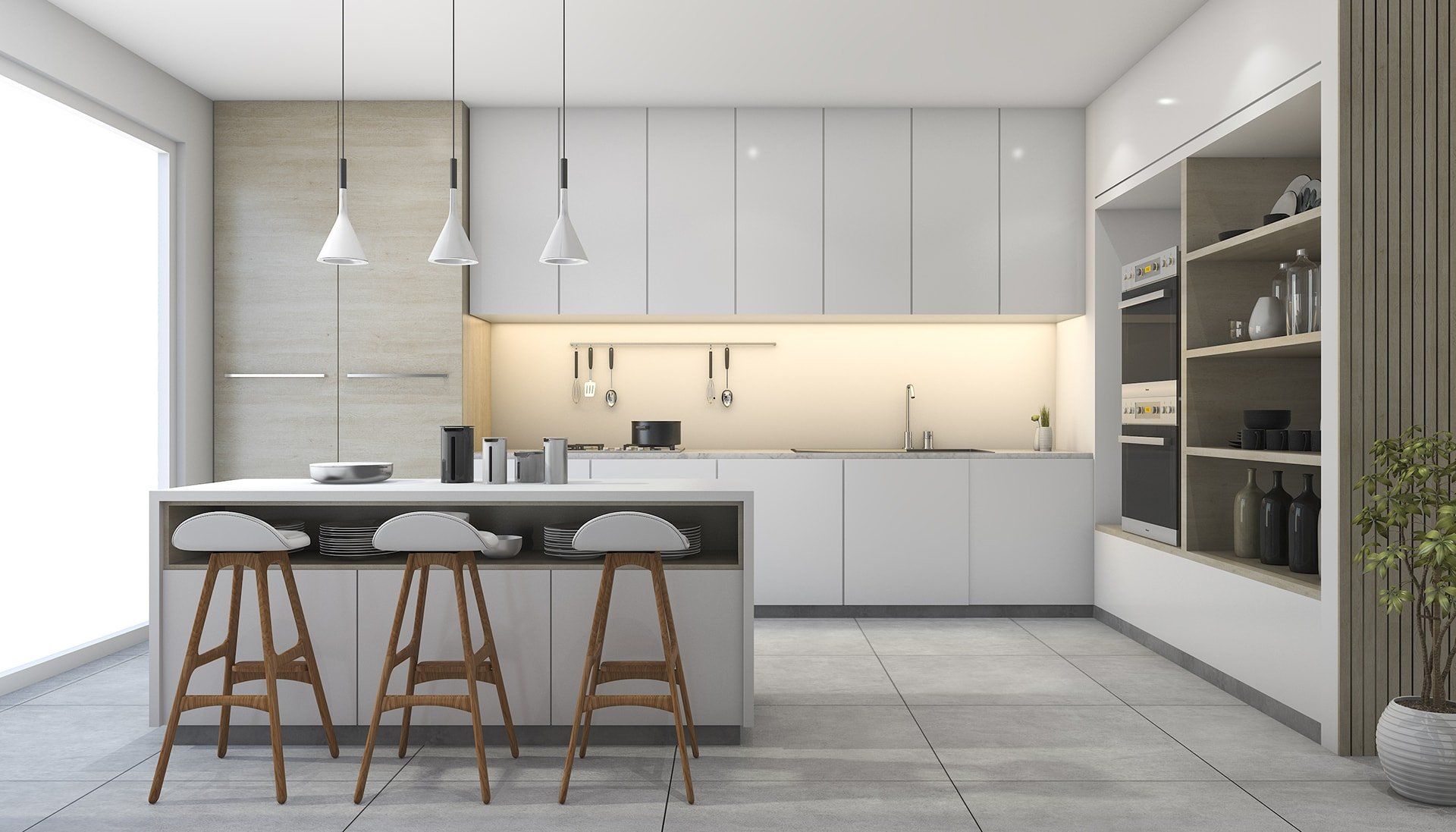 Cucina moderna bianca con isola, sgabelli, lampade a sospensione e mobili a incasso in un luminoso interno minimalista.