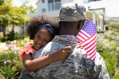 Military Man Having Fun With His Small Son — Parker, CO — A Houdek Counselings
