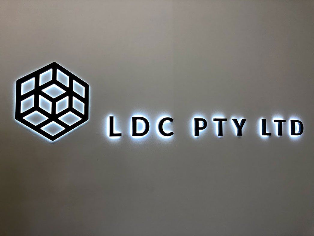 Black 3d Logo With Light Blue Lighting — Signage In Acacia Ridge, QLD