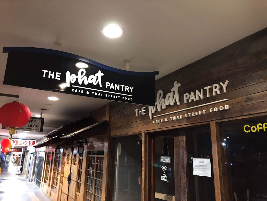 White Paint On Hanging Black Signage — Signage In Acacia Ridge, QLD