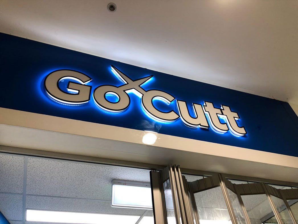 Backlit Logo On A Blue Background — Signage In Acacia Ridge, QLD