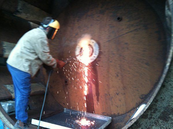 man welding