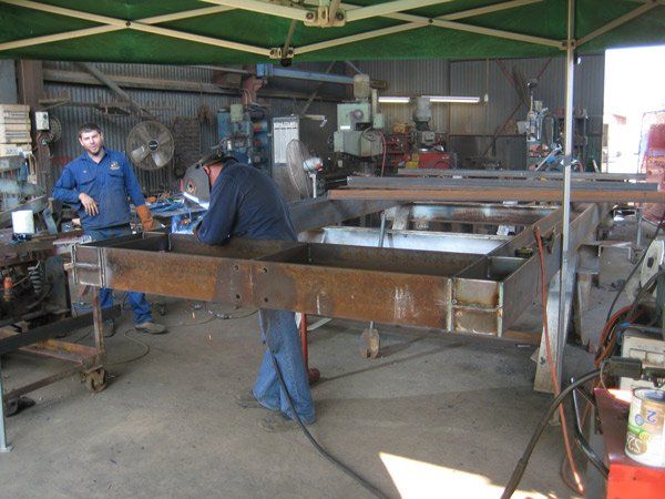 man welding metal