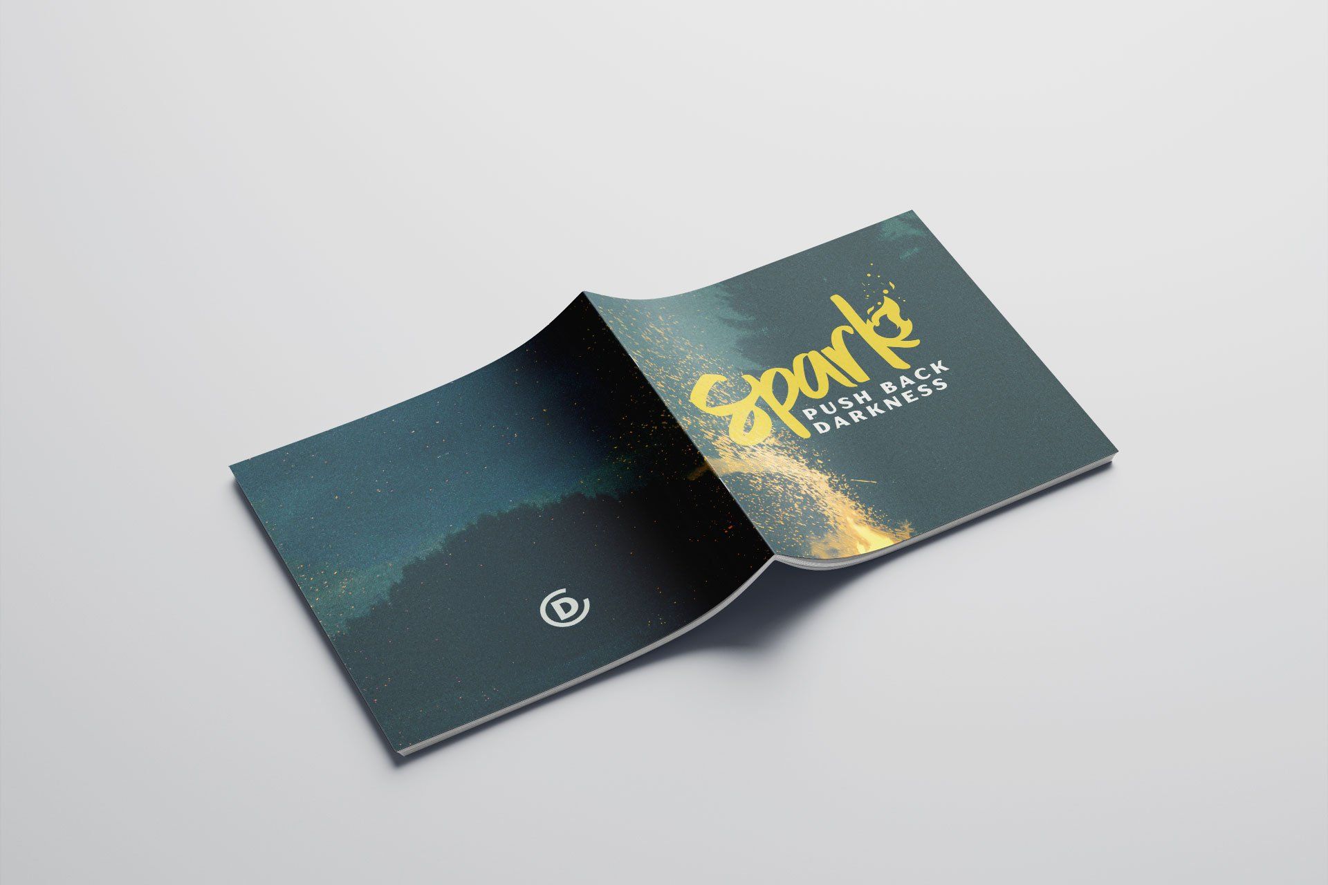A book is open to a page that says `` spark '' on it.