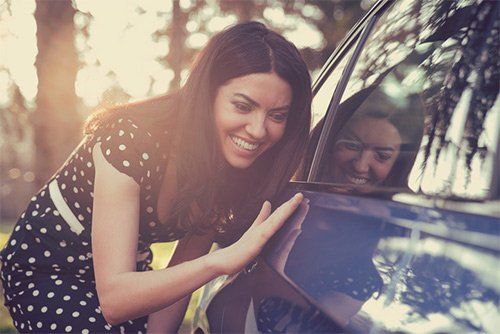 Happy Woman And Her Car