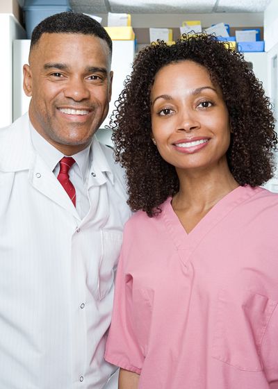 Dentist Showing Patient how To Clean Teeth — Atlanta, GA — Metro Dental