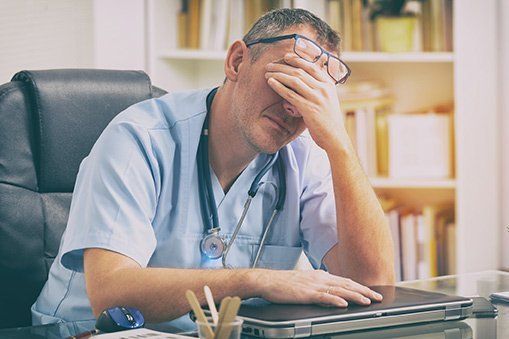 Doctor with Headache — Hampstead, NC — Hampstead Medical Center PC Doctor with Headache — Hampstead, NC — Hampstead Medical Center PC