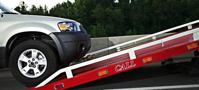car on flat bed