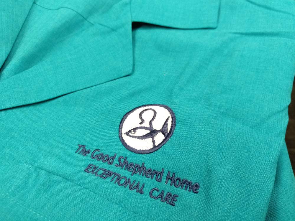 blue shirt logo embroidery