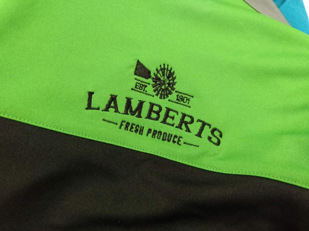 green and black shirt logo embroidery