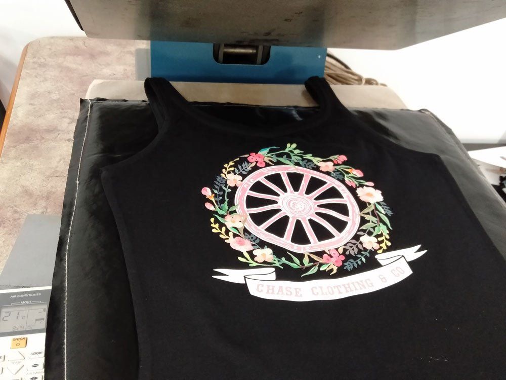 heat pressed image on black fabric