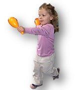 Little Girl Playing Maracas — Child learning center in Loomis, CA Little Girl Playing Maracas — Child learning center in Loomis, CA
