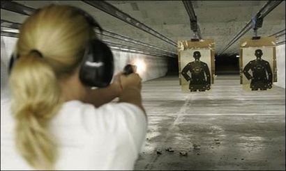 Woman Practicing in Shooting Range — Montgomery, AL — Workable Solutions Woman Practicing in Shooting Range — Montgomery, AL — Workable Solutions