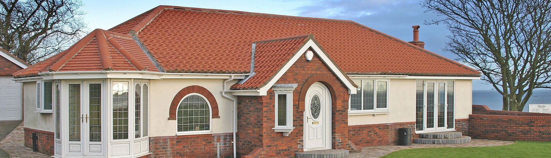 tile roofing on a big independent house