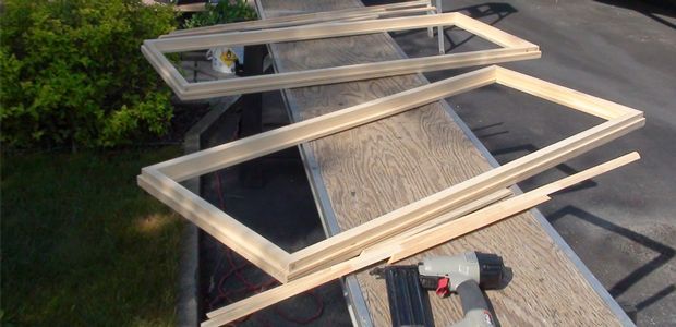 window screens being prepared for installation