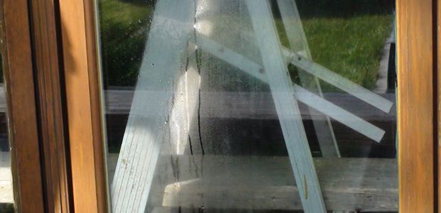 window with ladder on the other side