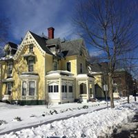 painted yellow building in snow- paint work in Brimfield, MA