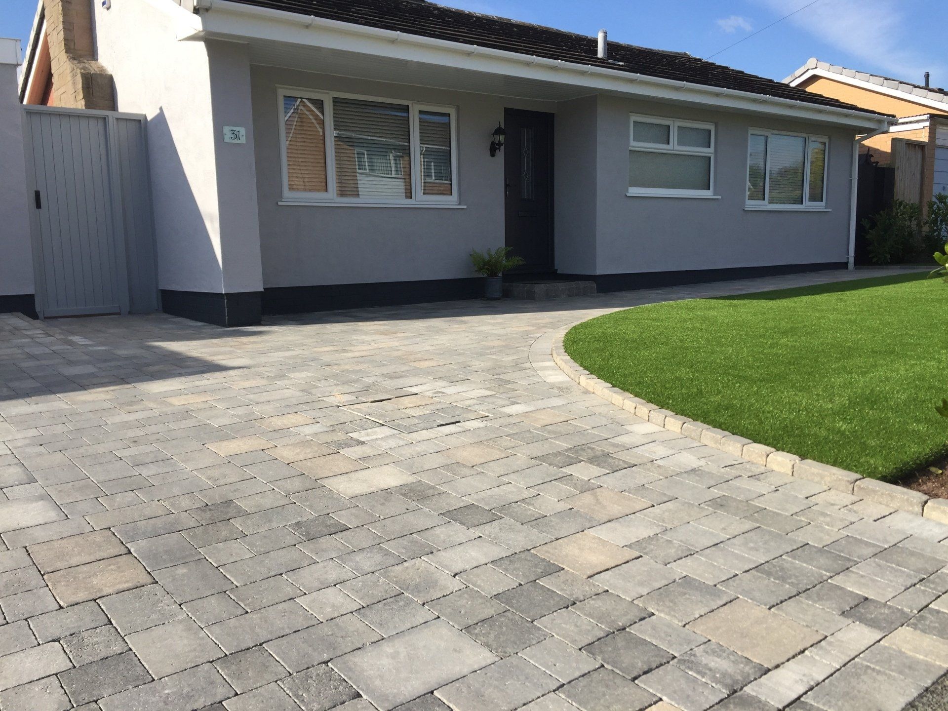 Stone patio with bricked edge