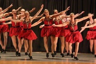 Tap Dancers Performing on Stage — Dance Studio Tri-Cities in Bristol, TN, Elizabethon, TN Tap Dancers Performing on Stage — Dance Studio Tri-Cities in Bristol, TN, Elizabethon, TN