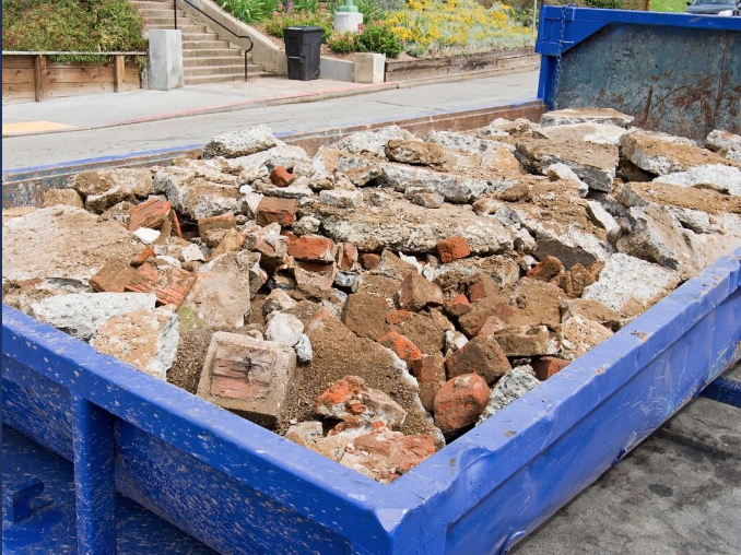 roll off dumpster full of concrete