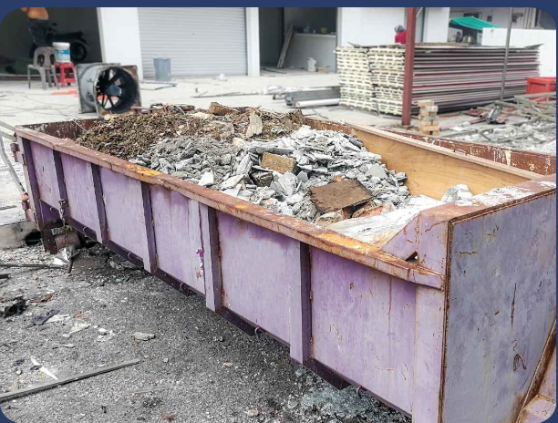 roll off dumpster full of heavy construction debris