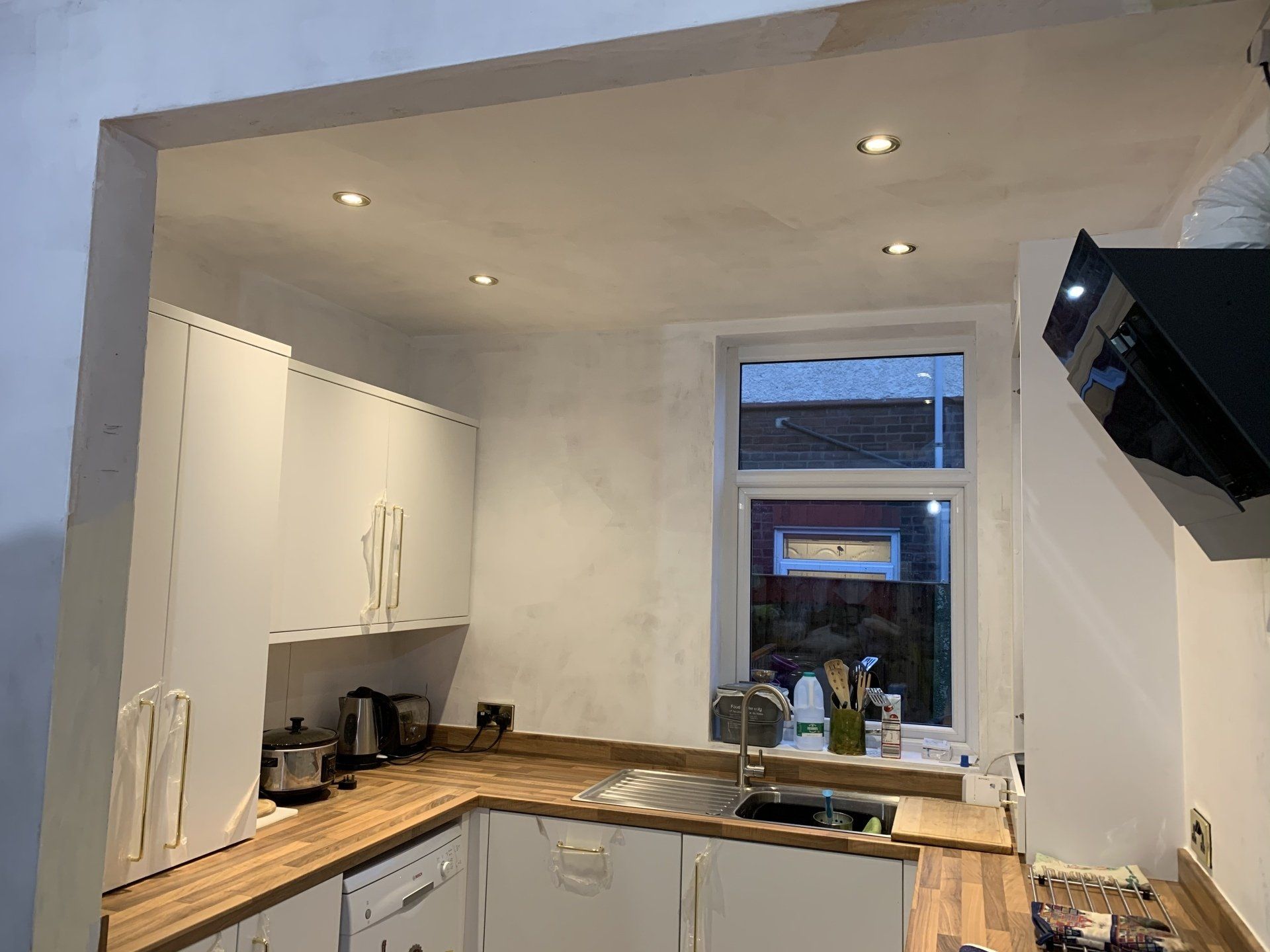Kitchen rewire adding spot lights and extra sockets in warrington    by Electrician4you in newton le willows