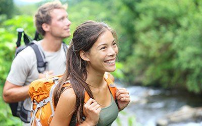Man & Woman Hiking — Greenville, SC — Wellness 4 Lifesteps LLC