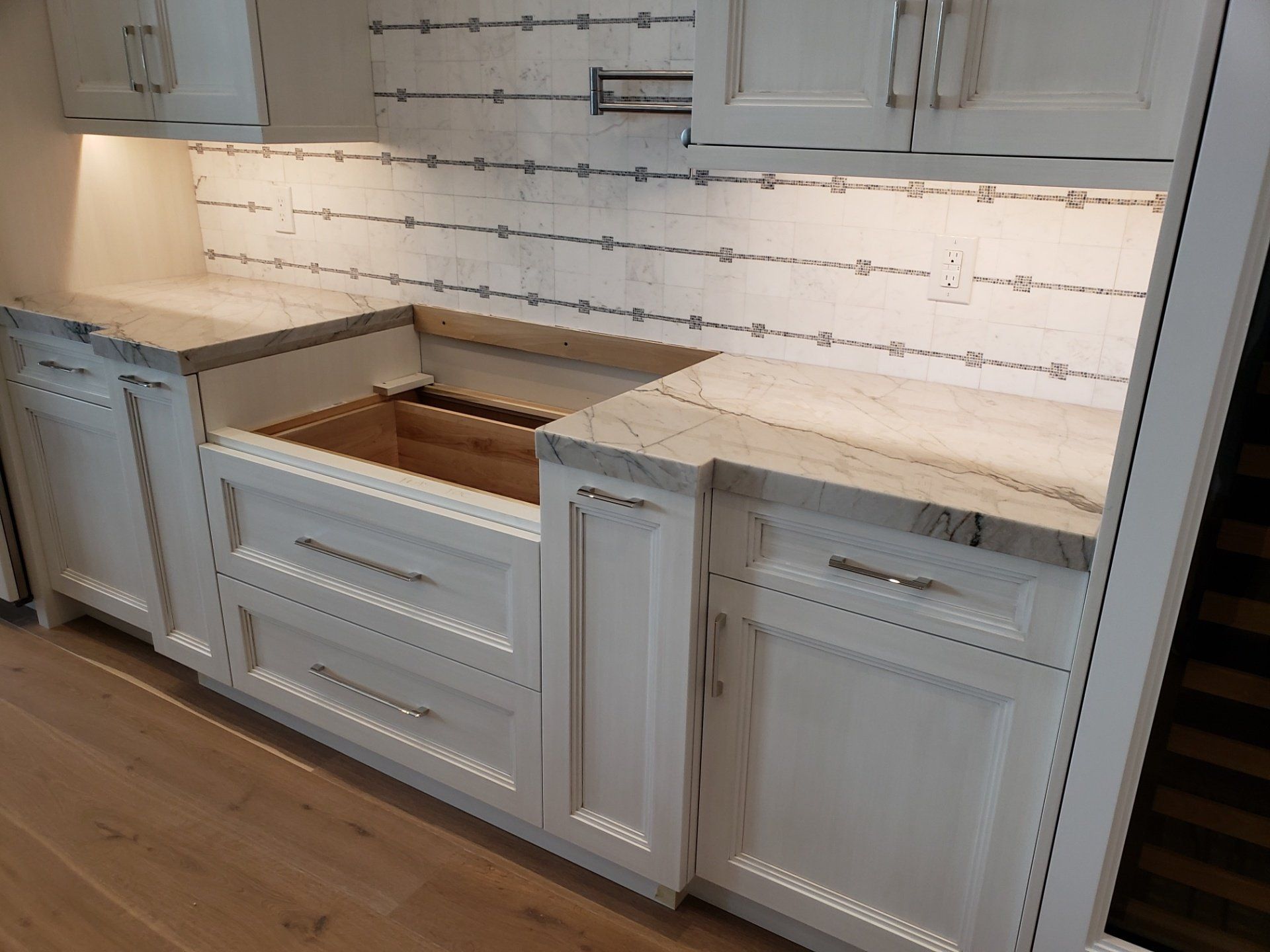 Countertop With White Cabinet — St Naples, Florida — Rain Forest Marble Inc.
