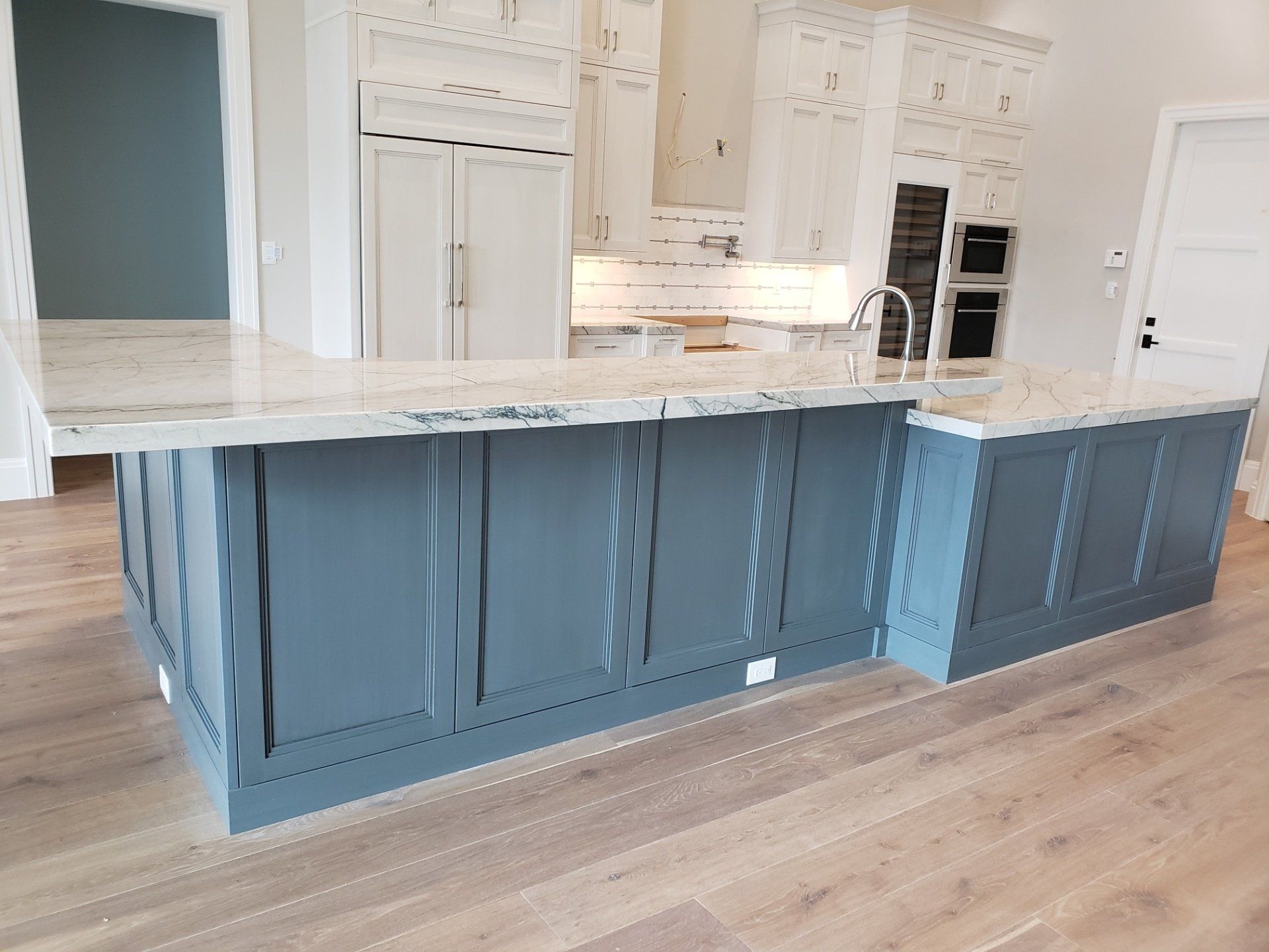 Countertop With Gray Cabinet — St Naples, Florida — Rain Forest Marble Inc.