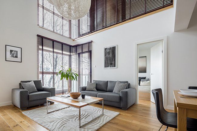 Living Room with Many Windows — Okemos, MI — Tony Grant’s Painting Company