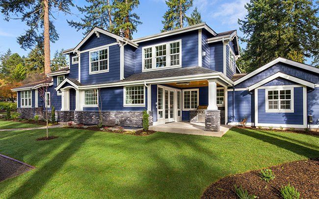 Beautiful Luxury Home Exterior — Okemos, MI — Tony Grant’s Painting Company