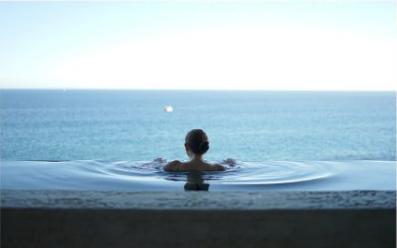 young woman swimming in a pool