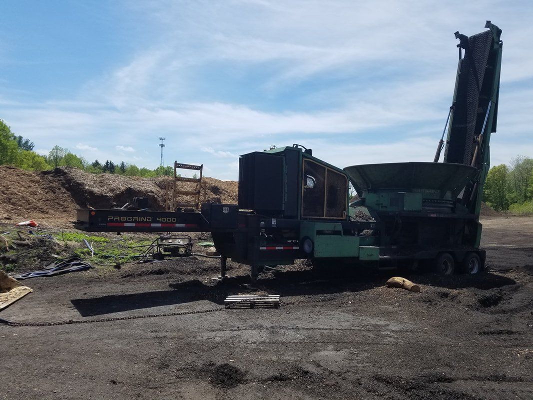 Tub Grinders Machine on Construction Site — Monroe Township, NJ — Slammin Canz, Inc.